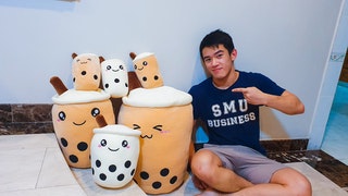 Tze Hing Chan with boba plush toys